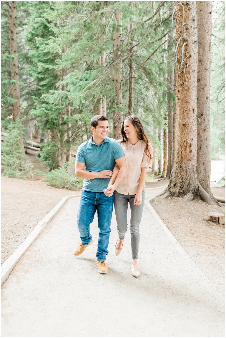 Taya Garrett Silver Lake Engagement Session big tall pine trees in mountains