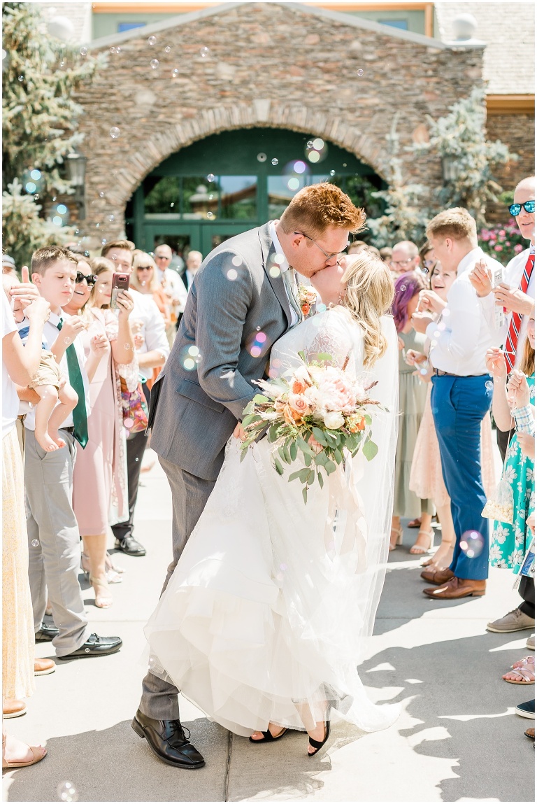 bubble exit Oquirrh Mountain Temple Wedding - Ashley DeHart Utah Wedding Photographer